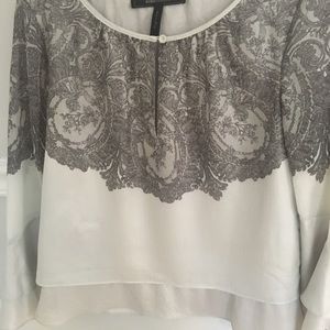 White and grey blouse